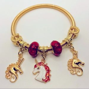 Bracelet golden Unicorns and lucky horse shoes